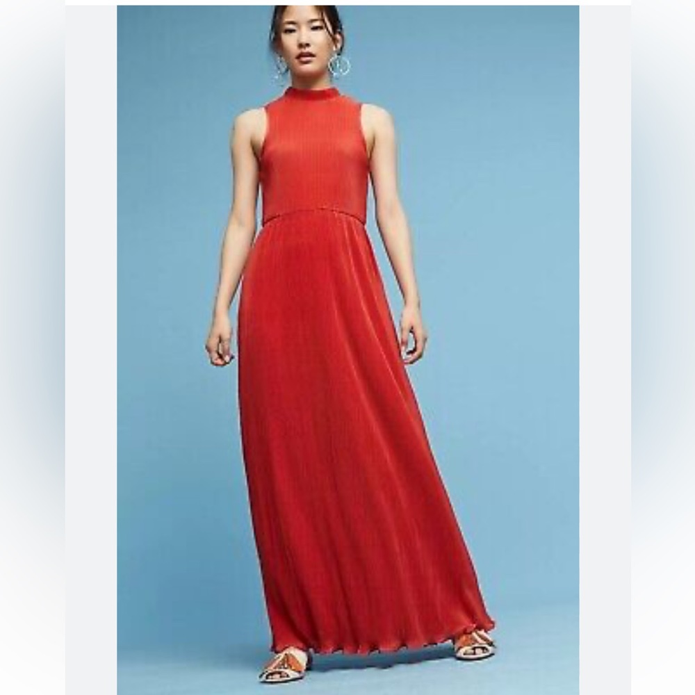 Fame and Partners red gown